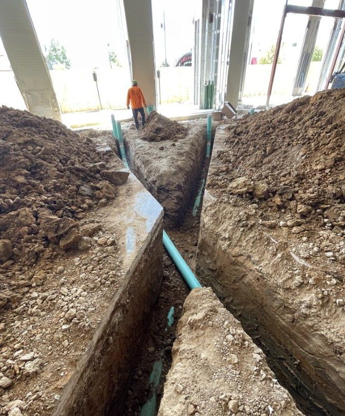 Express Plumbing Company - Placing Pipes for Commercial Building